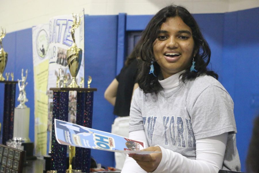 FROSH ROCK: Senior and HOSA member Sanchali Pothuru passes out flyers at Frosh Rock on April 4. Frosh Rock is an annual event held by CHS GKOM where upcoming freshmen have the ability to preview high school clubs.