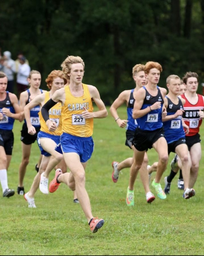 Kole Mathison, cross country runner and junior, breaks the five kilometer school record in a time of 14:52.10 at the Riverview Health Flashrock Invitational. Coach Altevogt said that the team will be top contender for the State championship in late October.
