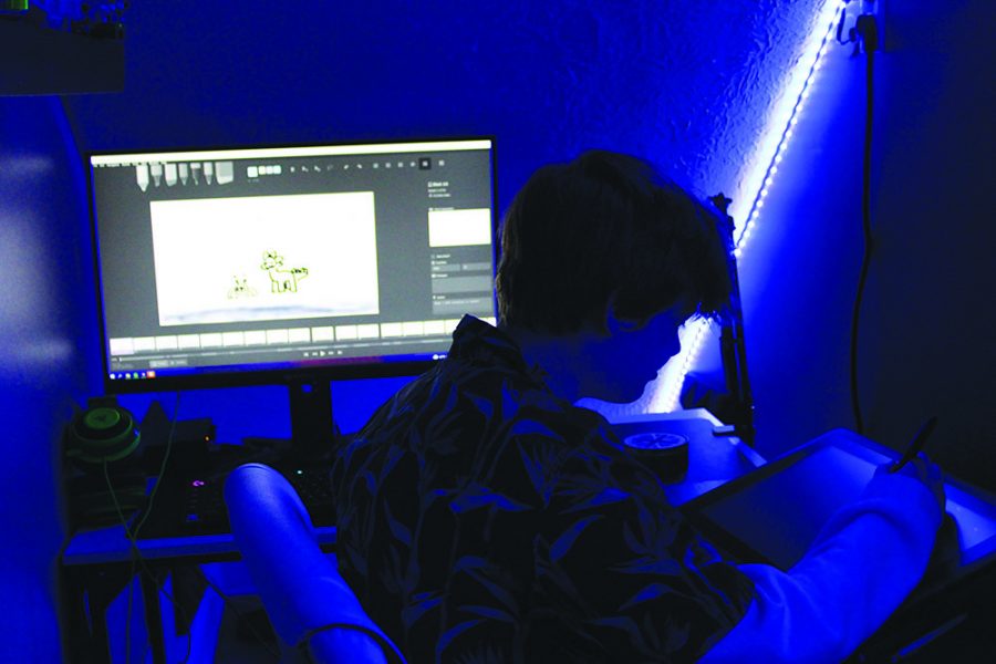 screen time: Sophomore Ren Olson works on creating a frame for his short film. He said he is in the digital storyboarding phase of the project and that he gained inspiration for his design from Disney XD’s popular show Gravity Falls.  