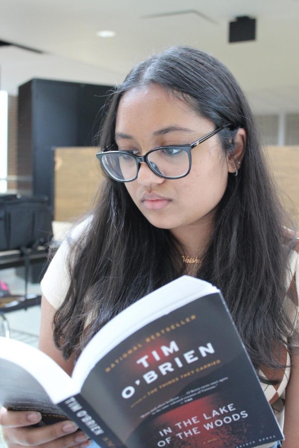 Sophomore Vaishu Majji reads a book. Majji said when she was younger, the media she consumed made her feel she couldn’t like traditionally feminine things because female antagonists shared those views.