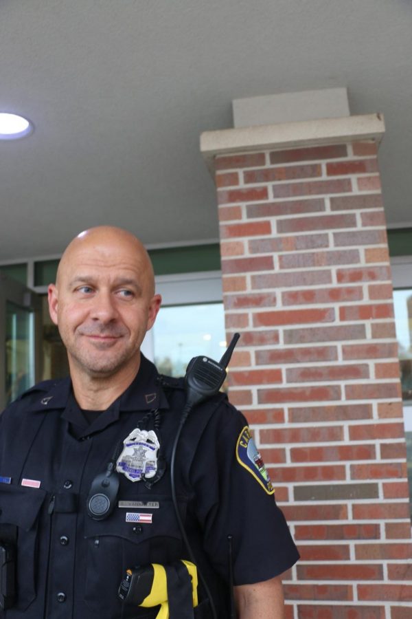 SRO Shane VanNatter stands outside the school in the morning. VanNatter said he will participate in this year’s No-Shave November events as a a member of the Carmel Police Department.