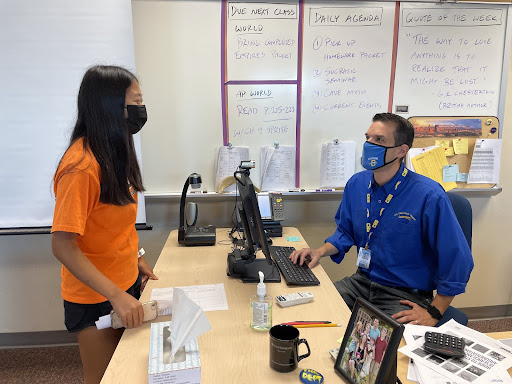 Brooke Ye, GKOM member and junior, discusses GKOM sessions plans with sponsor Ryan Ringenberg. Ye said, “I’ve been enjoying our sessions and look forward to helping freshmen feel more supported throughout the school year”.
