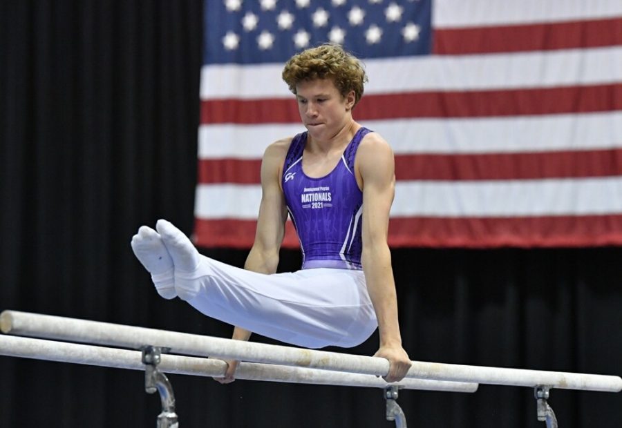 Mansberger performs his routine on the parallel bars at the 2021 Development Program Nationals. Mansberger placed 40th overall.