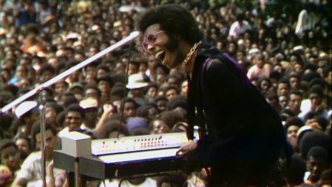 Sly Stone of Sly and the Family Stones performs for the 1969 Harlem Cultural. As a psychedelic soul group , their music helped contribute to the diverse music scene of the films subject, including gospel, blues and pop as well. 