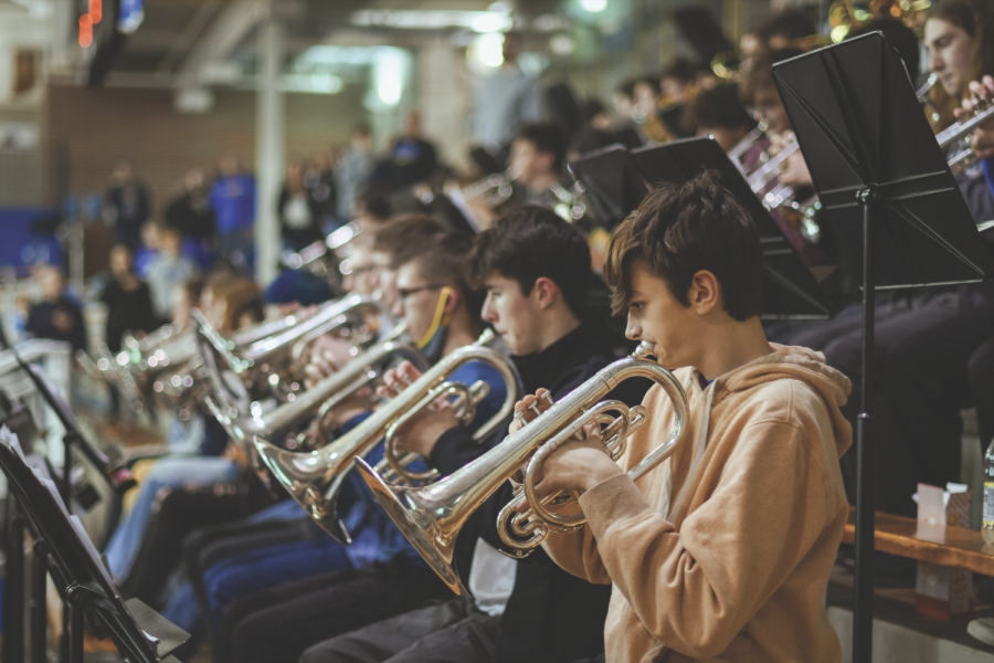 The pep band performs at a women’s basketball game to motivate the players. Pep band director Andy Cook said the band helps engage the crowd and keep everyone entertained.