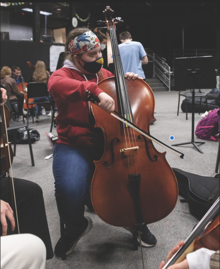 Madeline (blank) plays the
cello at a United Sound
meeting. Ishaan Singh, United
Sound president and junior
said, “It’s a good community
service activity.”