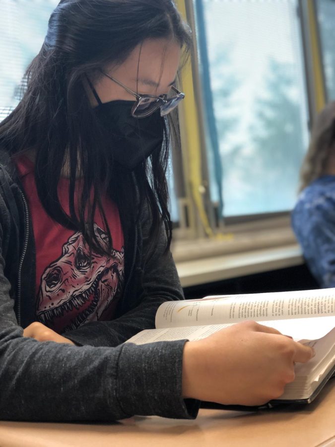Anna Liao, HOSA member and freshman, studies the textbook she is using for SLC preparation in her homeroom during SSRT on March 25. Liao and 58 other members have signed up for the conference and have been reviewing for their separate events. Liao said, “It’s overall just been studying like I would for a regular test.”