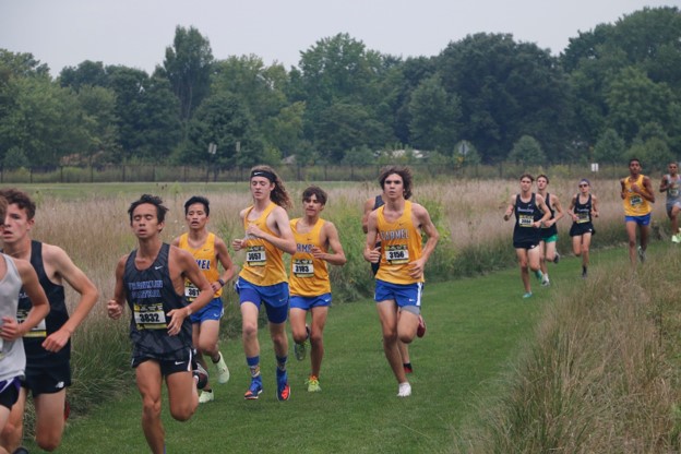 Men’s cross country team runs against many schools in the Brownsburg Invitational. Coach Altevogt said that the team has a great chance to be a top contender for the State championship in early October.