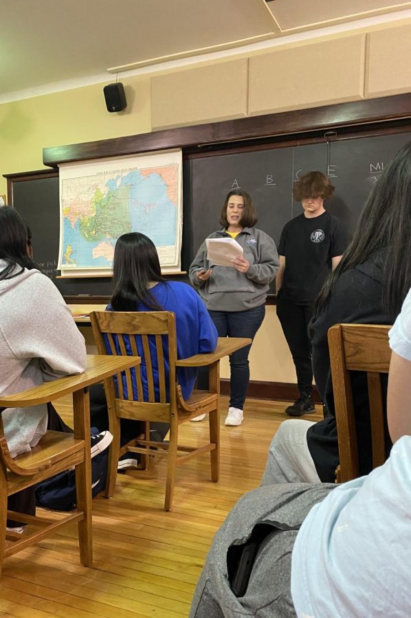On Feb 17, U.S. History teacher Peggy Lehman (left) and junior Mason King (right) engage the class in a game about World War Two to help the students get a better understanding of the historical time period. King elaborated on the game, Mrs. Lehman would ask a question and then whoever raised their hand first got to answer. The twist was if you got a question right you would have to pull a card that could either give you points or take some away.