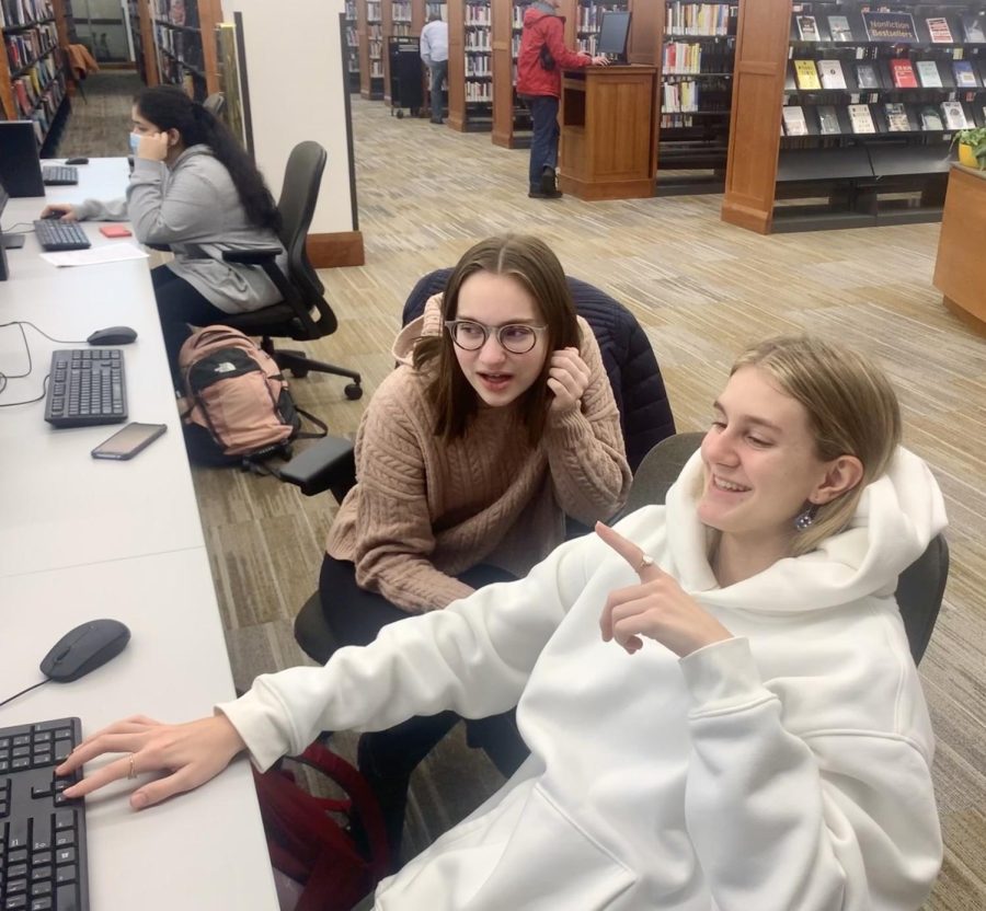 Sophomores Evelina Rubchinsky and Kelly Fulk work on their debate cases for the upcoming state debate competition. The competition will be held at Marion University on Feb. 1.