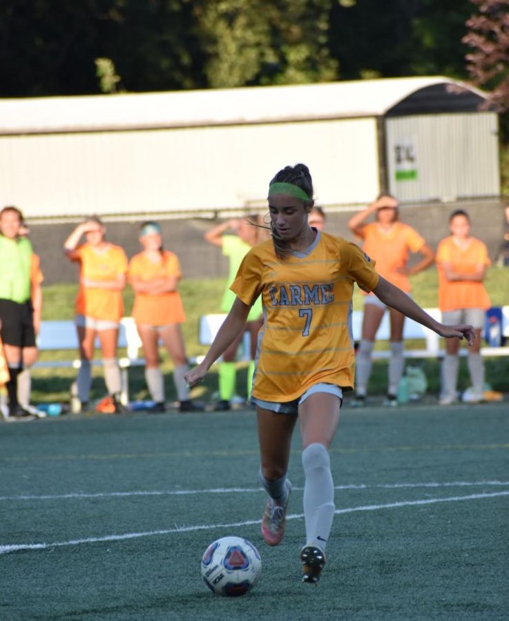 Freshman Olivia Joyce dribbles the ball on Aug. 16, 2022 during a home game against South Bend St. Joe. The final score was 1-0. Photo: Maggie Meyer
