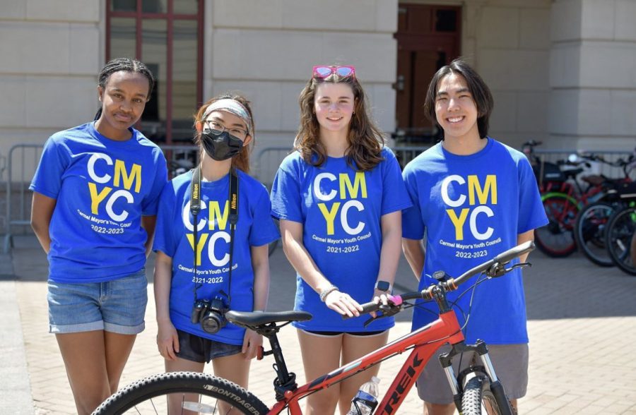 Members of Carmel Mayor’s Youth Council (CMYC) pose for a photo during their valet bike parking service at the Carmel Farmers Market on July 9. President Bhavi Vishnumolakala said CMYC Bike Parking is the only event run by CMYC that generates revenue for the council.