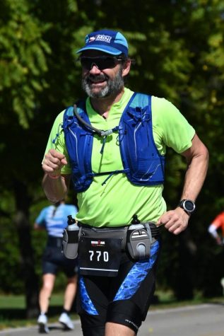 Math teacher Scott Staley runs in the Ironman 70.3 race in Muncie, Ind. on Oct. 1, 2022. He said he plans to run 1,000 miles this year.