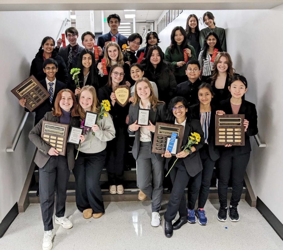 The+speech+and+debate+team+pose+after+their+Districts+competition.+Sponsor+Joseph+McMillan+said+the+competition+went+well+as+Carmel+placed+first.+%28Submitted+Photo%3A+Anushka+Pandey%29