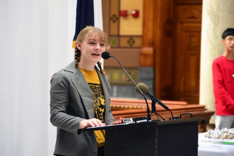 Ashlyn Walker, co-executive director of Confront the Climate Crisis and junior,
speaks during a climate rally at the Indiana Statehouse. Walker said, “I think climate change is a bipartisan issue...It affects everyone in the world.”