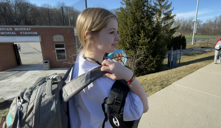 Junior Mallorey Cheslock walks to lacrosse practice after school. Cheslock said she thinks the SROs are nice, citing “hallway high-fives,” and she said she thinks the new policy plans for the rest of second semester have the chance to help a lot of people.