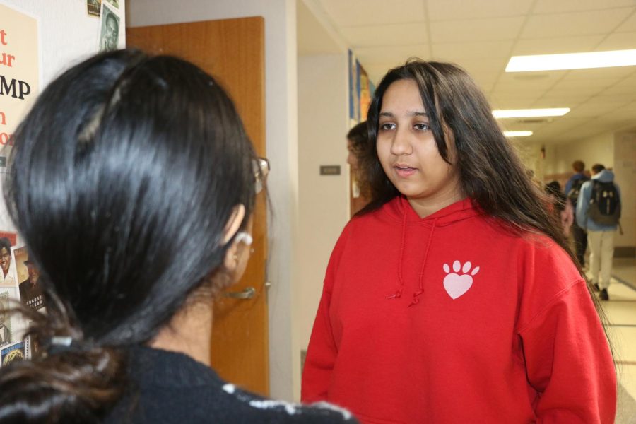 Sophomore Savneet Dulay discusses the lack of minority teachers with Akshaya Lingala on Feb 16th, 2023. Terri Roberts-Leonard, CCS equity and inclusion officer, said exposure to diverse teachers benefit students of any background.
