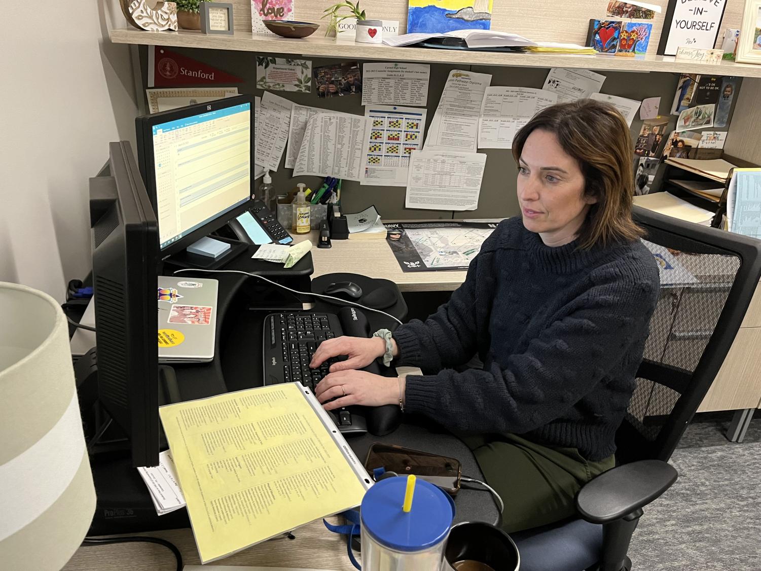 Counselor Casey Danubio sorts the waitlists for next year’s courses on March 20, 2023, at CHS. Danubio said counselors are calling down students who need to pick a different class.