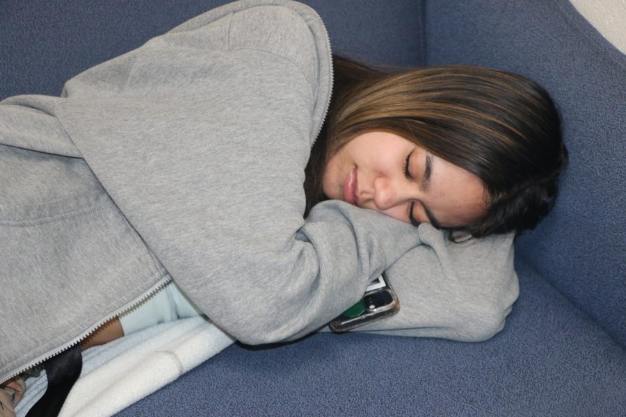 Sophomore Abbygale “Abby” Karpinski lays her head down on a couch on March 14, 2023. “SSRT is a huge resource for students who are sleep deprived,” said Karpinski.