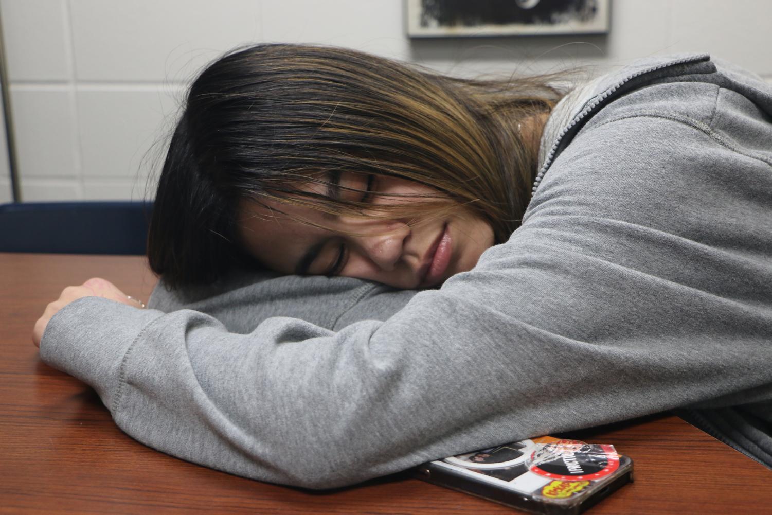 Sophomore Abbygale “Abby” Karpinski naps on a desk during SSRT on March 14, 2023. Karpinski said that due to the number of classes she is taking she is often overwhelmed with the amount of work she has to do.