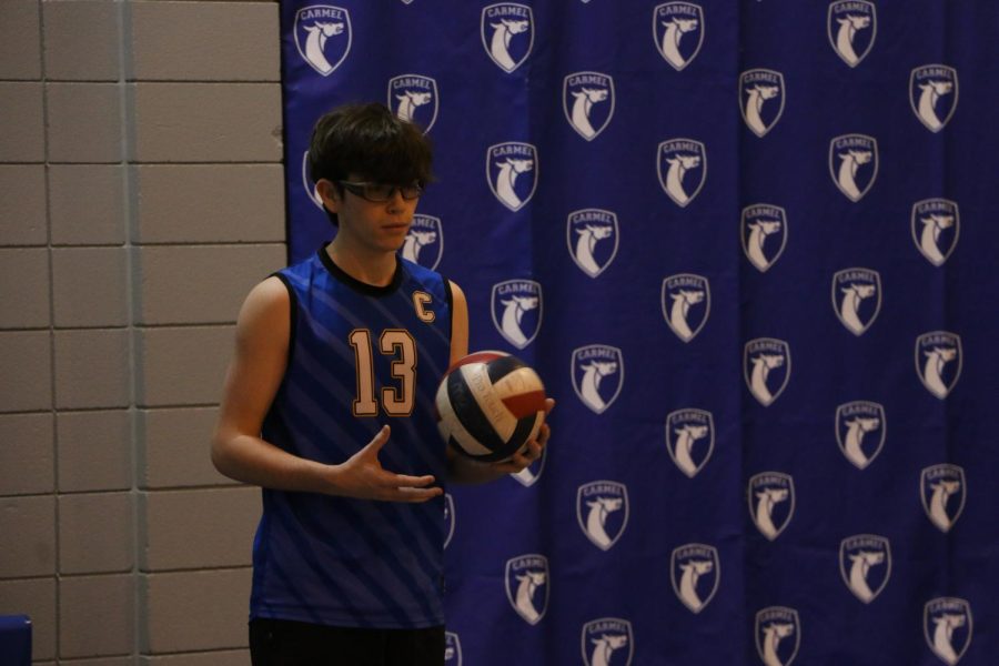Aiden+Thomas+prepares+to+serve+at+home+game.+Thomas+said+he+hopes+the+recognition+of+mens+volleyball+from+IHSAA+will+get+more+men+to+join+the+sport.