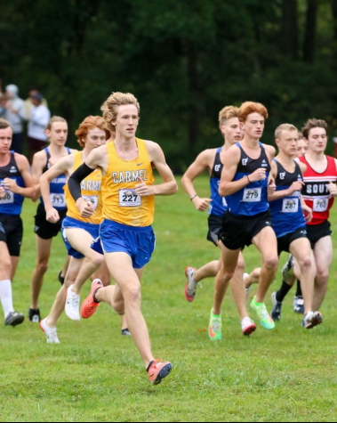 Kole Mathison, track runner and senior, breaks the five kilometer school record in a time of 14:52.10 at the Riverview Health Flashrock Invitational. Coach Altevogt said that the team will be top contender for the State championship in early June.