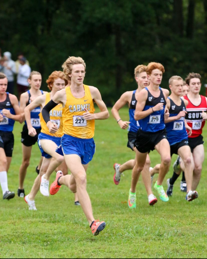 Kole+Mathison%2C+track+runner+and+senior%2C+breaks+the+five+kilometer+school+record+in+a+time+of+14%3A52.10+at+the+Riverview+Health+Flashrock+Invitational.+Coach+Altevogt+said+that+the+team+will+be+top+contender+for+the+State+championship+in+early+June.