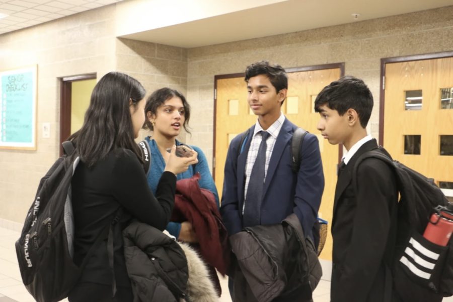 Speech and debate members discuss recent competitions after personal successes. As a whole, the speech and debate team has a successful season. (Submitted Photo: Anushka Pandey)