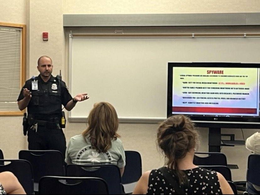 Blake Lytle, Master Patrol Officer and CHS SRO, uses a presentation to teach staff members about security risks at CHS. Lytle said informing teachers about safety in the building is a great way to get more teacher involvement in security.  