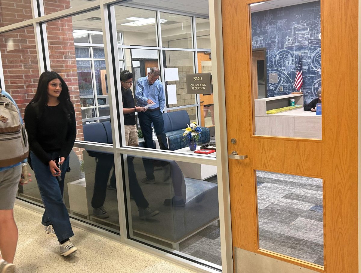 Junior Sara Syed walks to the guidance counselor’s office to discuss her 504 plan. Syed said, “My counselor has been very helpful in accommodating my illness and it takes some of that weight off of my shoulders.”