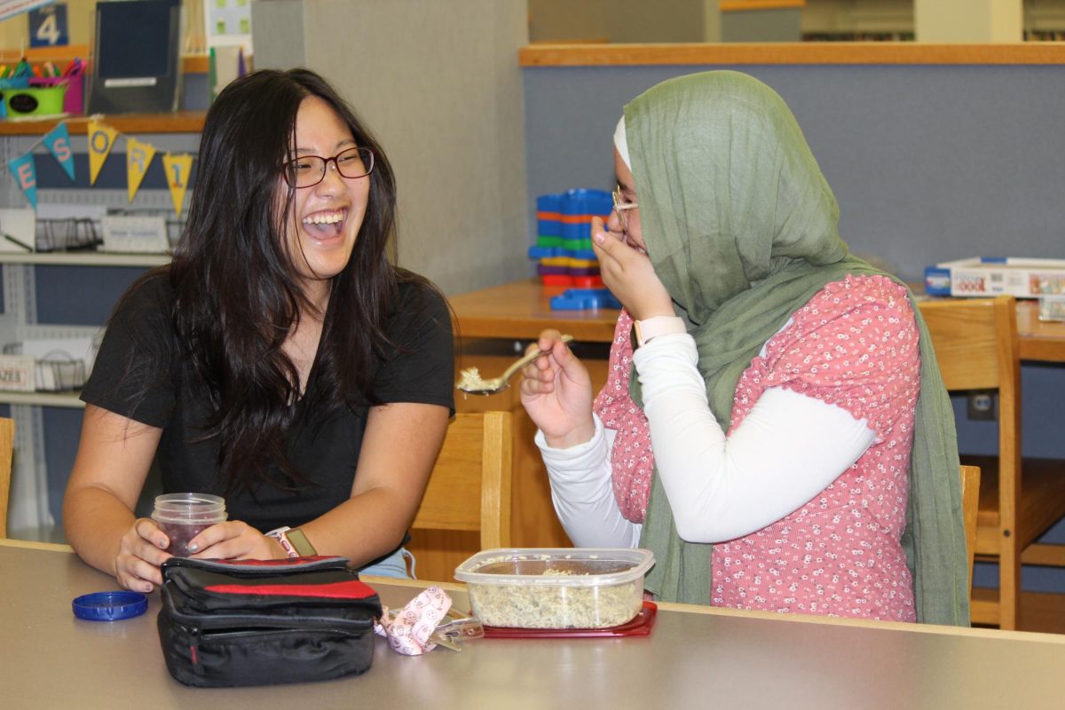 Seniors Celine Yang (left) and Jenna Khasawaneh (right) enjoy lunch together on Sept. 25, 2023. I really enjoy being able to bring my own lunch because I enjoy it more than the food at school, said Khasawaneh.