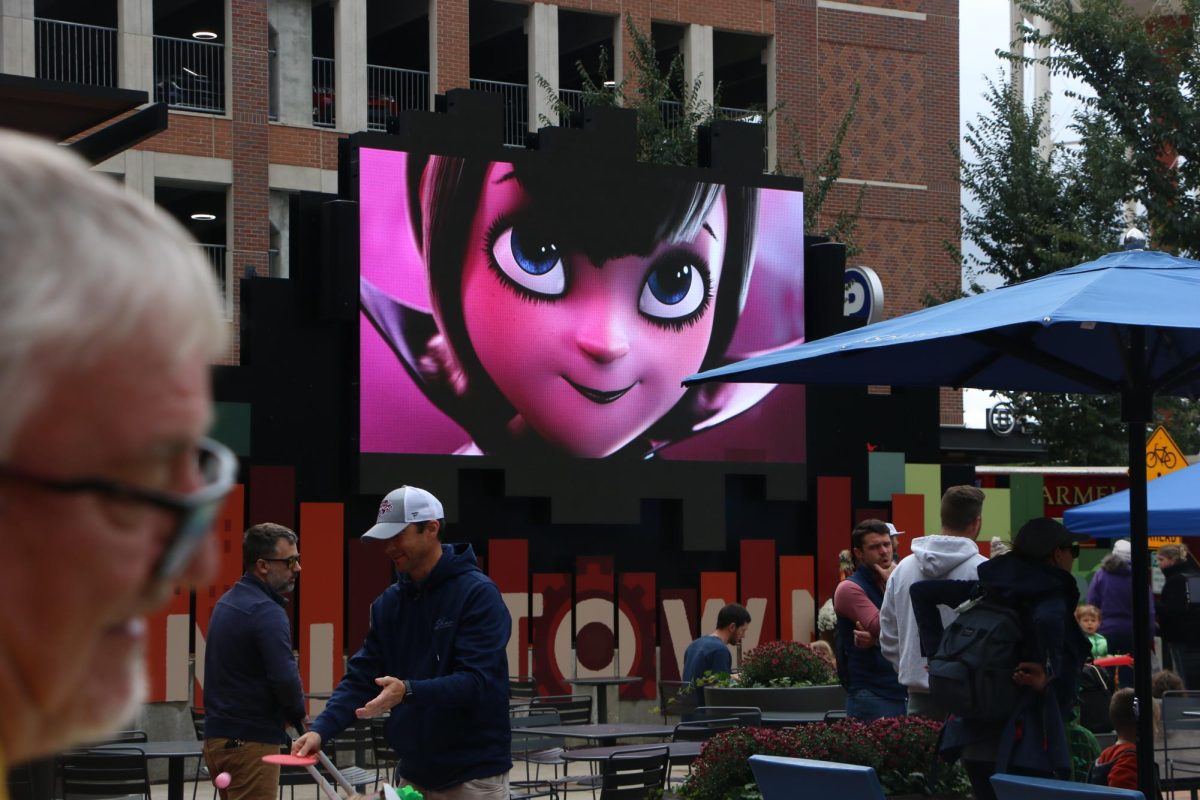 The movie Hotel Transylvania plays on the big screen at Midtown during The Arts in Autumn event on Oct. 14. The event was a daytime Halloween experience and lasted from 2 to 6 p.m. and boasted all sorts of Halloween themed products and fun.