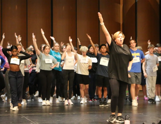 Choreographer Sloan Bayer taught dance moves during the tryout auditions on Oct. 24. 