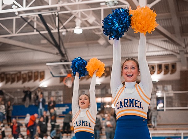 Q&A with cheerleaders, cheer coaches about differences between football and basketball cheer