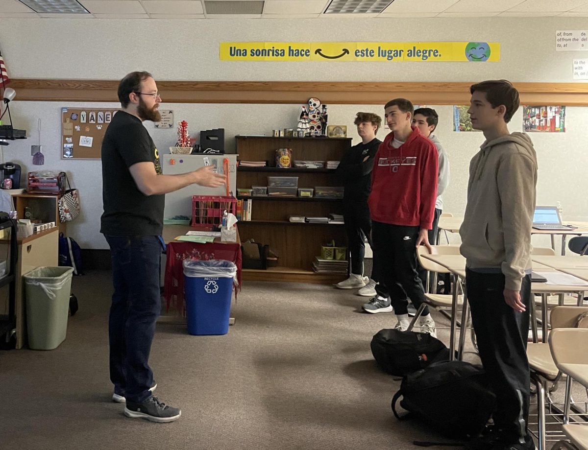 Spanish teacher Matthew Cinkoske gives a lesson about conjugating verbs to his Spanish II class on Dec. 6. Cinkoske said via email that one of the benefits of being multilingual is an increased awareness and understanding of other cultures.