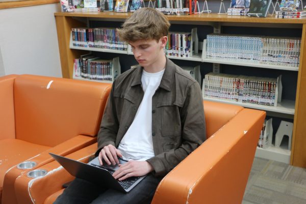 Senior Nick Stitle works on his next book on at the CHS Media Center on Feb 8th, 2024. The next book of Stitles The Stormless series is set to release sometime in 2024. 