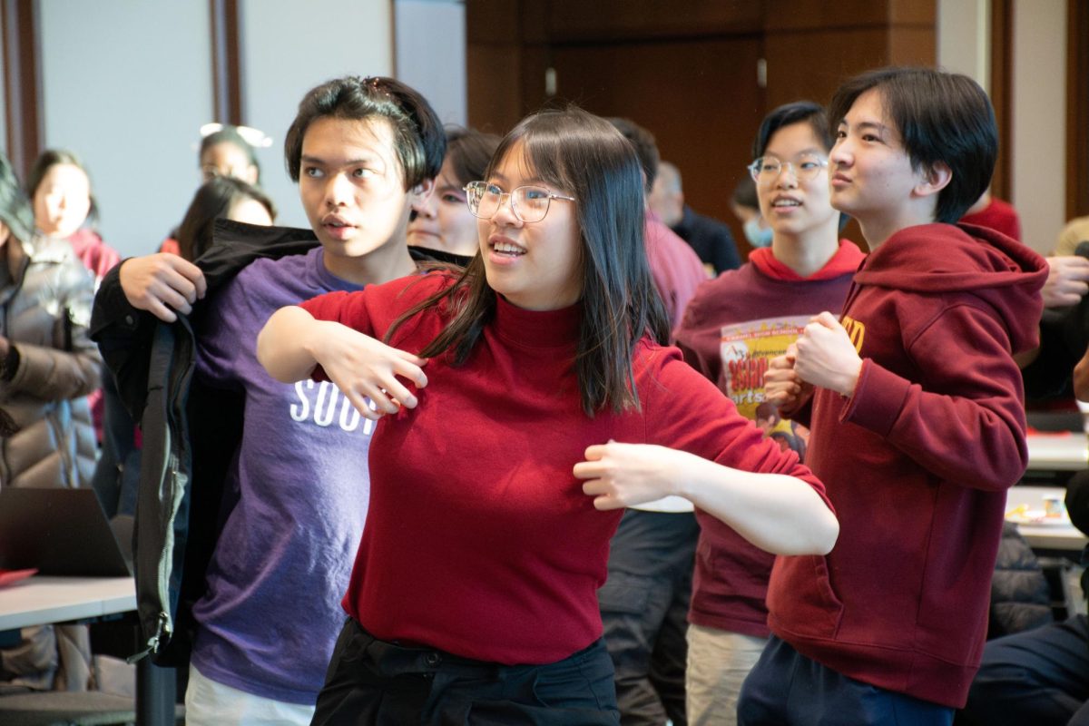 Senior Jessica Chen and others dance to Just Dance.