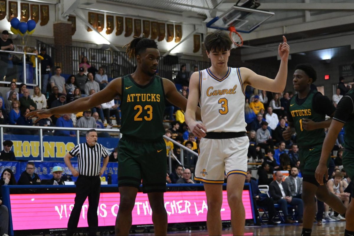  Varsity men’s basketball player Alex Couto competes on his home court. Couto said as a junior he wants to be a leader for his teammates and help them succeed.