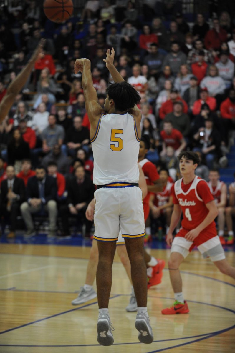 Freshman Aiden Dickinson plays in varsity game against Fishers on Jan. 27. Carmel won 54 to 46. When asked about his favorite part of the season, Dickinson said, I would say when we went on a stretch, we went 7-1, winning seven games in a row.