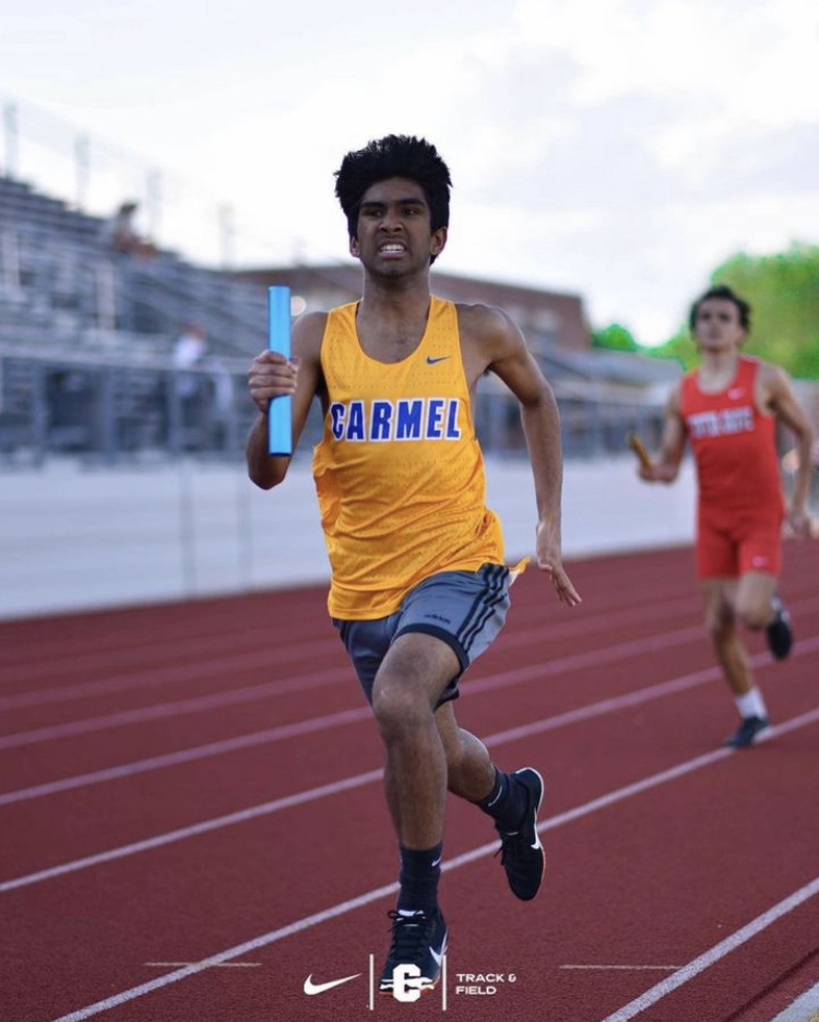 Sriyesh Sirineni, track and field runner and junior, runs in the HSR finals at home. Coach Altevogt said that the team will be top contender for the State championship in early June.