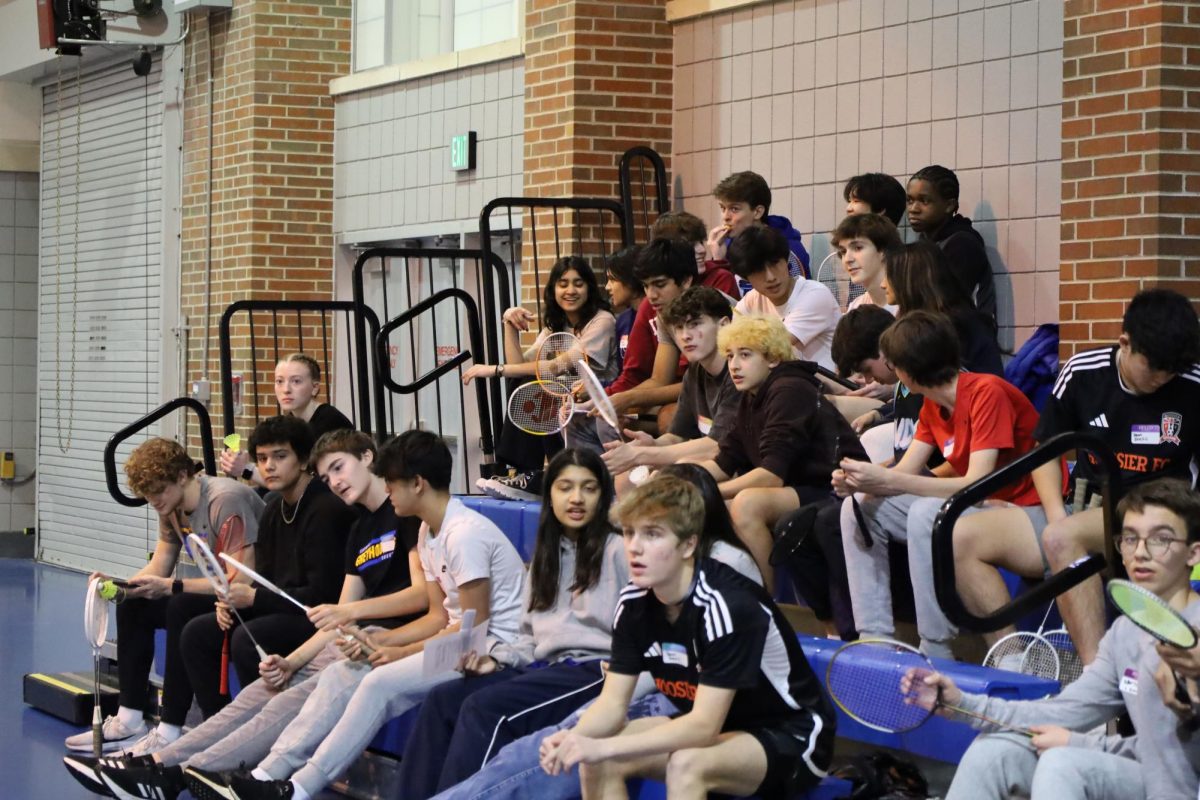 Students sit on the bleachers as they wait for the Carmel Mayor Youth Council (CMYC) badminton tournament to start on Feb. 16. The tournament, partnered with Badminton Club, raised $558 for Riley’s Children’s Hospital.