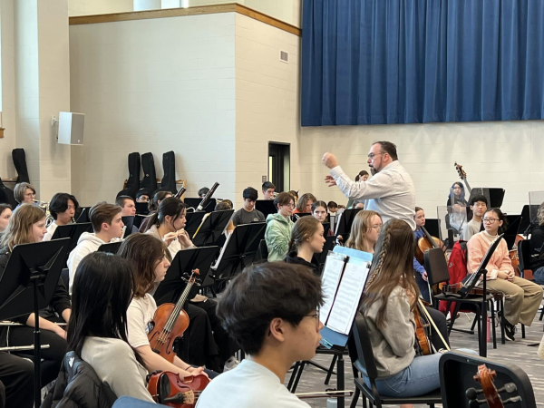 Philharmonic Orchestra members practice their pieces for the qualification performances for the ISSMA State Competition. Taylor Zhuang, member of Camerata Orchestra and sophomore, said orchestra rehearsals have become more challenging, but the challenge has been very helpful. 