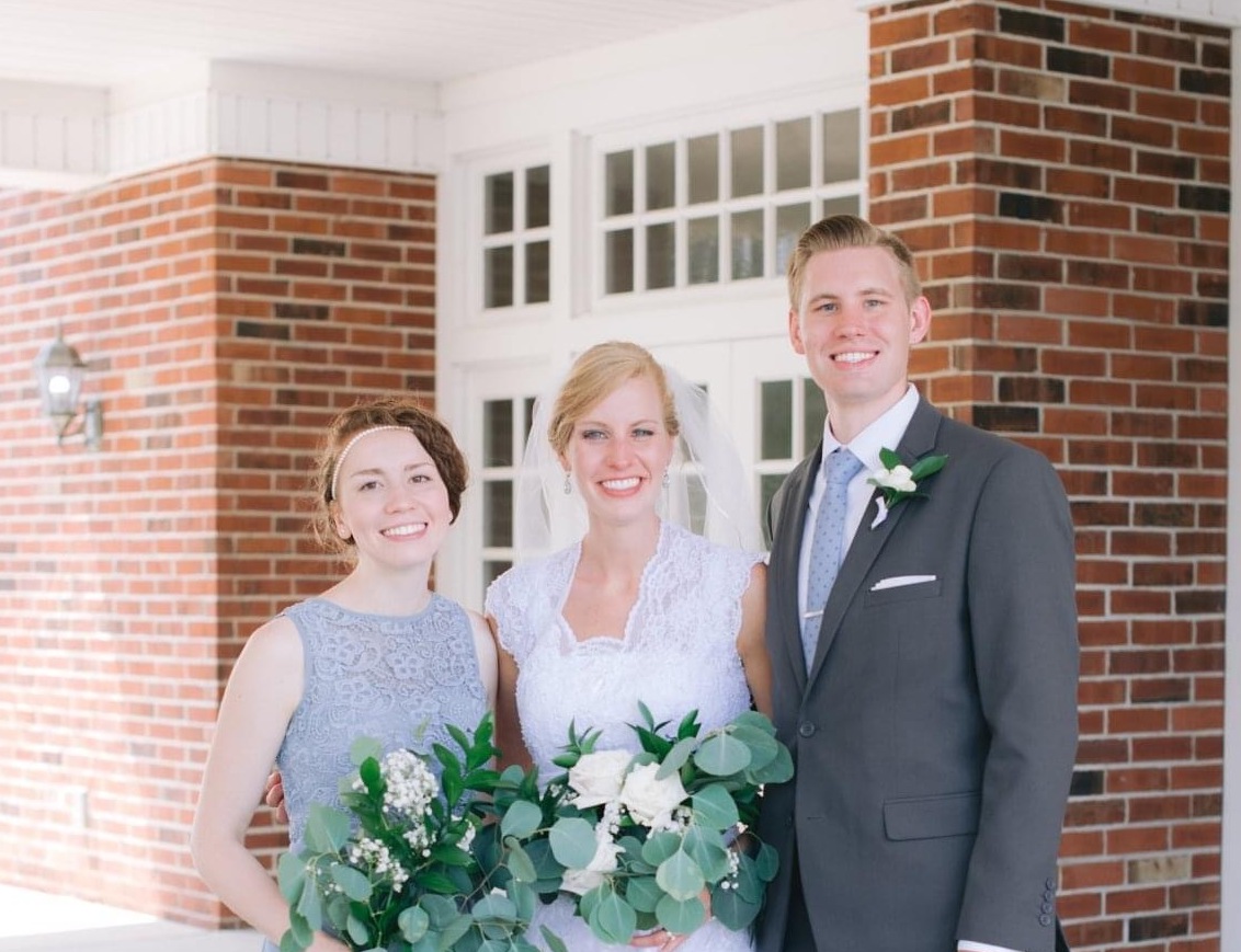 McMillan stands with his siblings, Merilee, his older sister, and Abby, his younger sister, for a photo. McMillan said he encourages middle children to develop positive relationships with their siblings and parents. (Submitted Photo: Park McMillan)