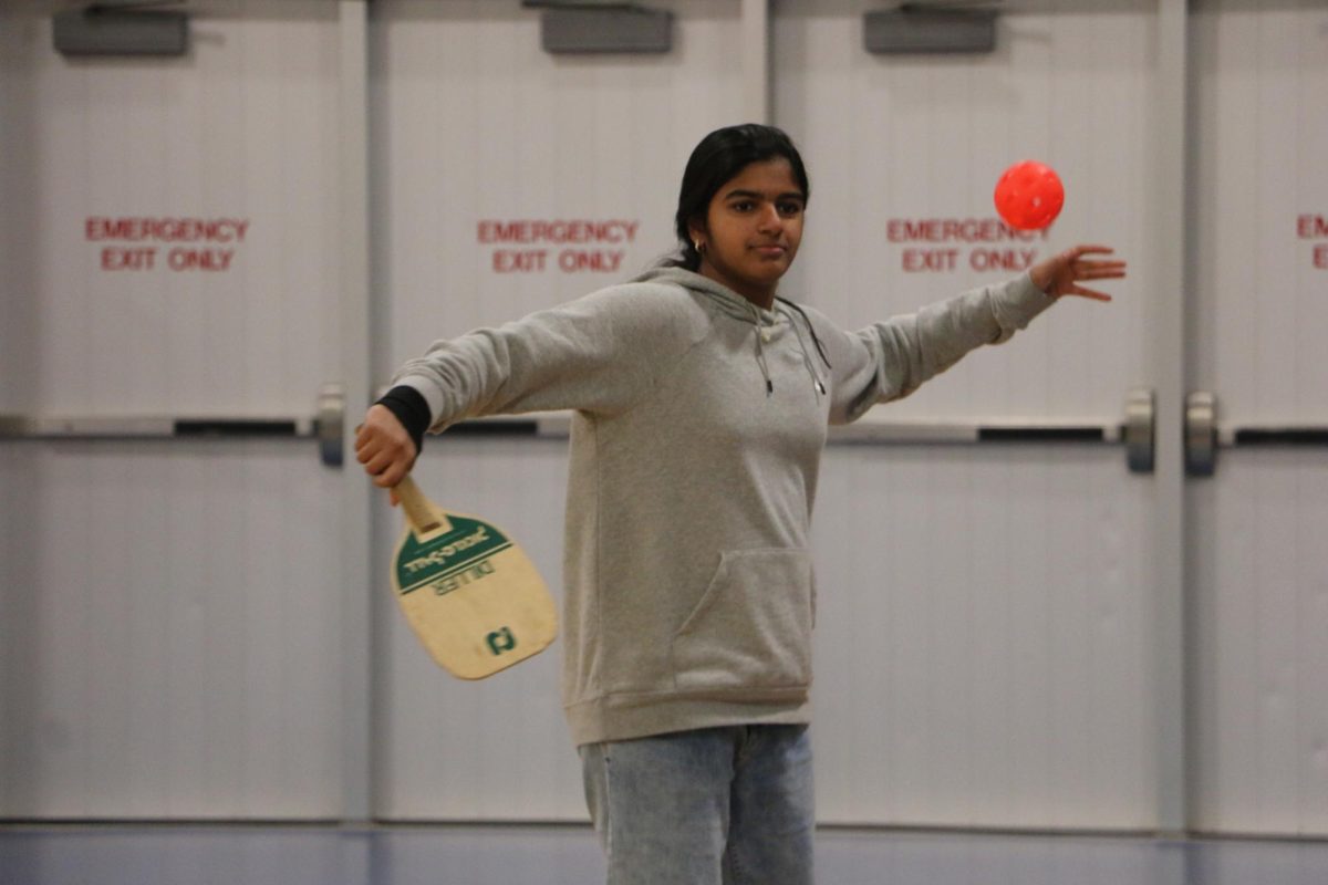 Sophomore Harshita Vallepalli hits a ball during the PicklePong Club meeting on Nov. 8. The club meets on scheduled Fridays, and will meet two more times before the end of the semester. 