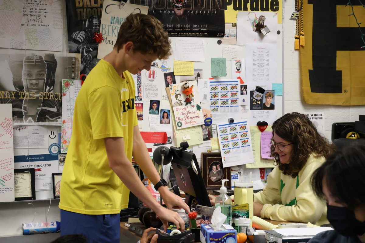 History teacher Allison Hargrove talks to a student during SSRT on Sept. 16. Hargrove said, "I feel like (a recommendation letter) something that (students have) earned and therefore if I get them in class for a year the least I have to do on my end is write them a letter, then I feel like it’s a privilege."