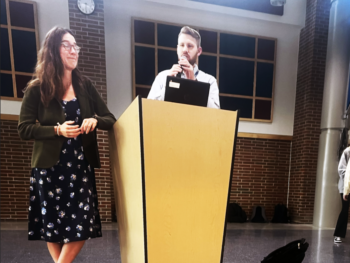 Speech and Debate coaches Emily Bell and Joseph McMillan present a slideshow to new members on club expectations. “It can be difficult at first to get used to a high school level of debate,” McMillan said. “But just take those leaps once you’ve got one under your belt. The rest gets easier and easier from then on out.”