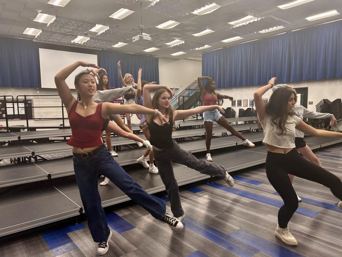 President of Accents Julia Peng (far left) and other Accents members rehearse on Sept. 12 for their upcoming fall concert on Sept. 26. Peng said, “We’re doing a ton of different performances, right now we’ve gotten really into the fall concert since it’s the soonest.”