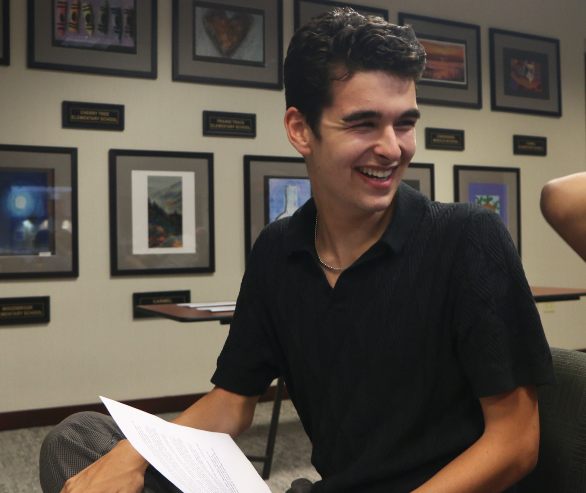 Senior Cole Dangler prepares to give his speech at the Carmel Clay Schools school board meeting on Aug. 26. Dangler was one of three students to provide a public comment.
