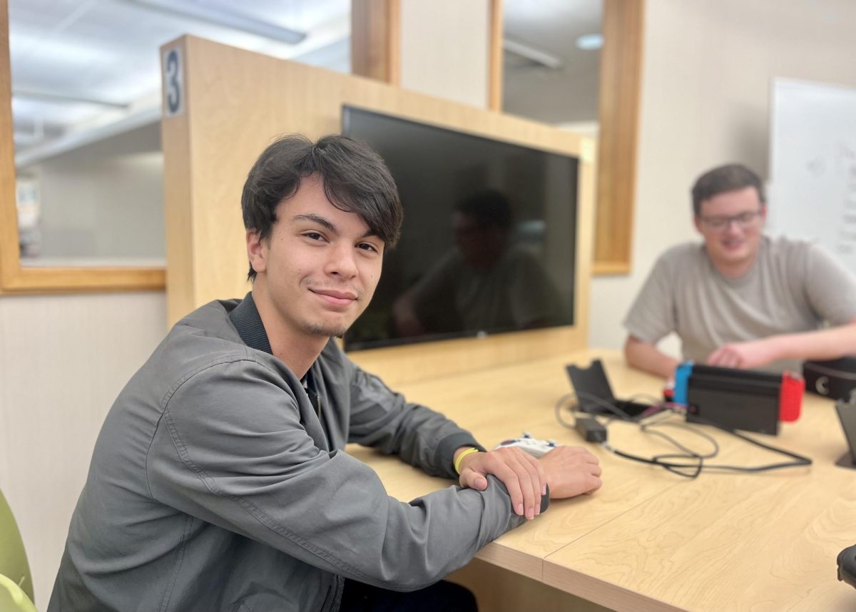 Senior and junior varsity member of the Esports Smash Ultimate team, Sean Bandy, waits outside of the Esports club meeting. He shares his goals of beating a varsity team member this season.