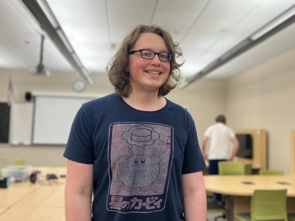 Senior and varsity member of the Esports Smash Ultimate Team, Jacob Hilbert, poses for a photo. This will be his fourth year competing at Manchester University’s 2024 Spartan Showdown, and he expresses his eagerness to meet new competitors and recognize old faces. 